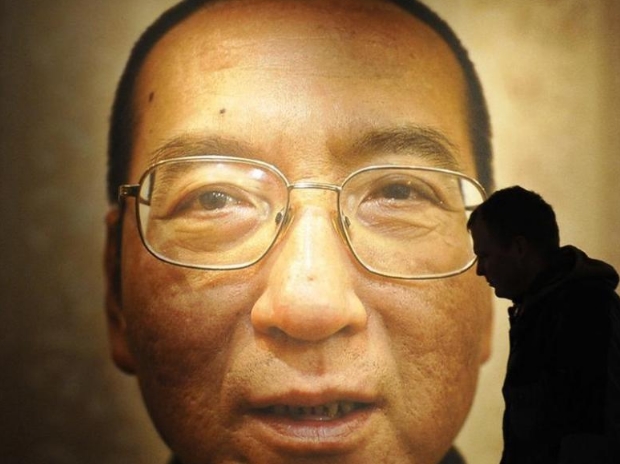 நோபல் பரிசுப் பெற்றவரான லியு சியாவ்போ உடல் அடக்கம்